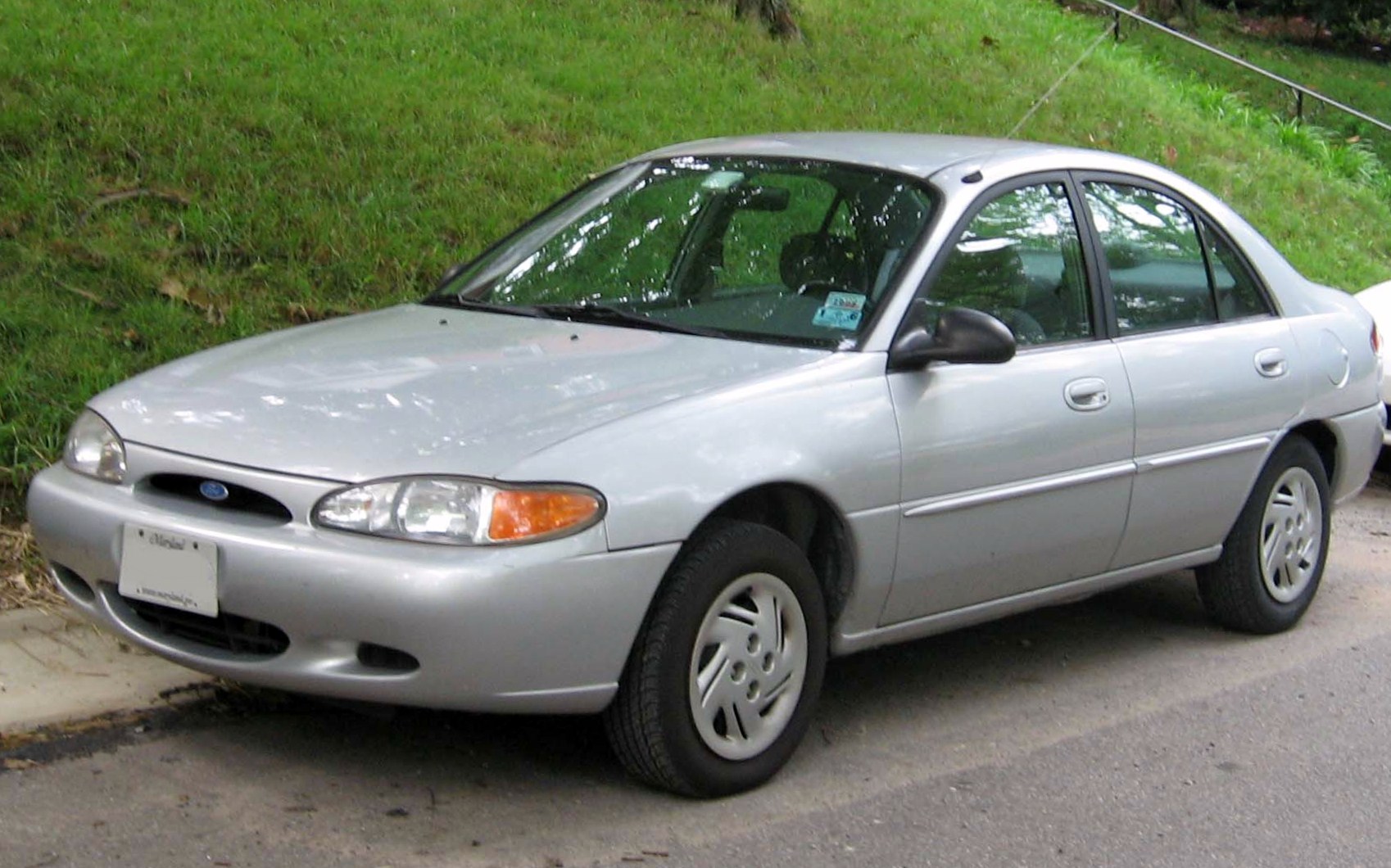 a Picture of a grey 97 Ford Escort sedan.